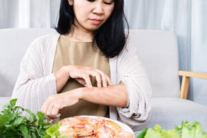 Woman has allergic reaction to shrimp